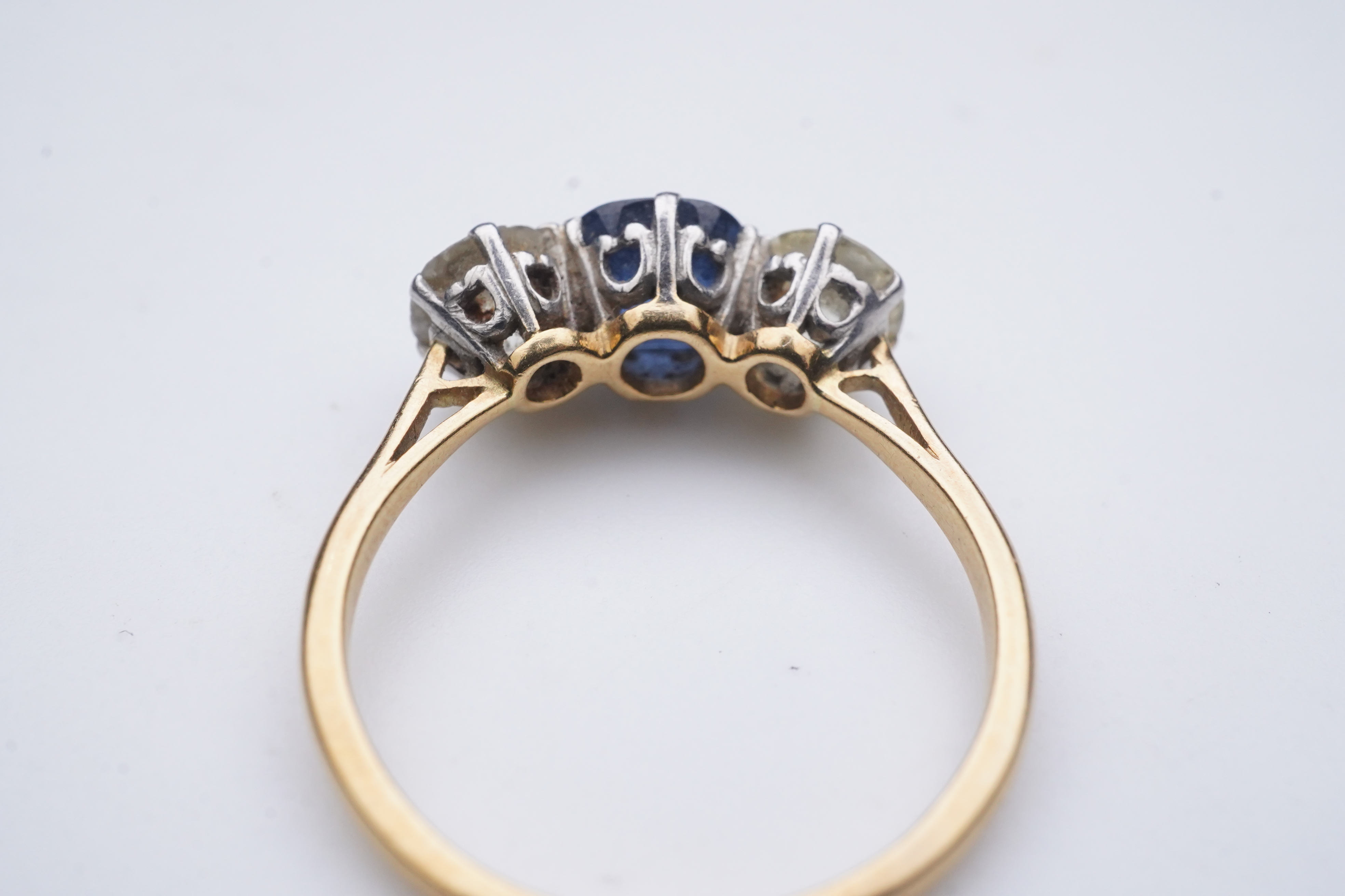 A sapphire and diamond three-stone ring, early 20th century